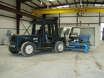 Sun Manufacturing Company move - Fork lift used to put the machine in place